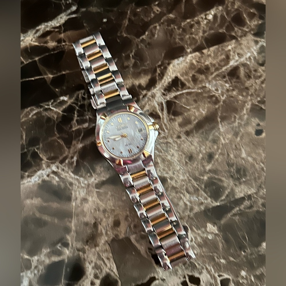 Citizen women’s watch two tone mother of pearl dial